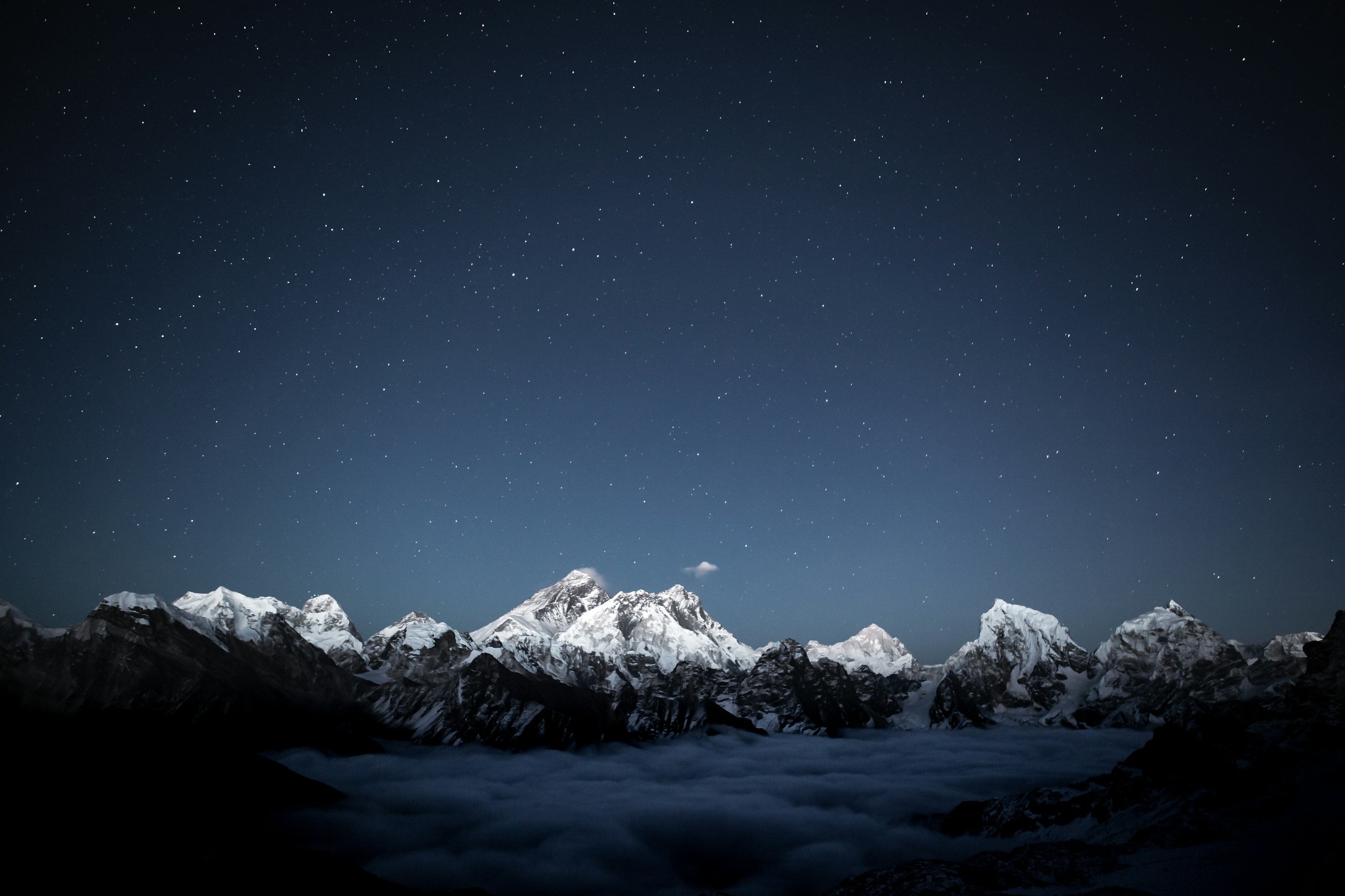 Everest range under a starry night sky